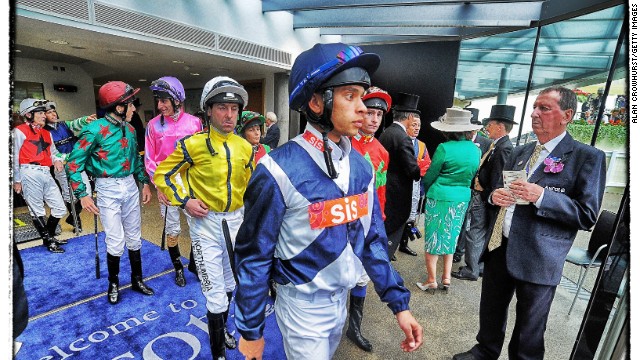 Royal Ascot, Ascot, Berkshire, UK: Jockeys leave the weighing room during day two of Royal Ascot. "Before the race, depending on where I am, I'll have a wander around the weighing rooms, among people looking at newspapers ... just little things that you wouldn't possibly have time to do during the races," Crowhurst says. 