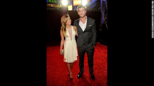 Cyrus and Liam Hemsworth arrive at the 2012 People's Choice Awards at the Nokia Theatre L.A. Live in January 2012 in Los Angeles.