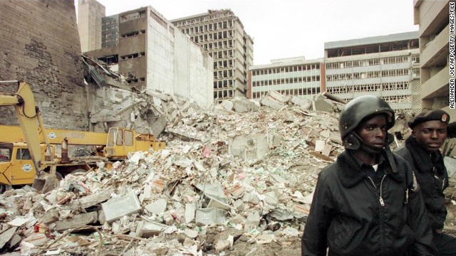 The blast on August 7, 1998 at the U.S. Embassy in Nairobi, Kenya, killed more than 200 people. Kenyan security guards keep watch on August 8, 1998, at the scene of explosion.