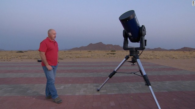 Astronomer Rob Johnstone uses his free time to observe the stars from an airstrip in the desert.