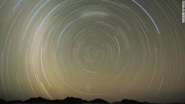 Thought to be over 55 million years old, the Namib Desert is free from light pollution, making it an ideal spot for stargazing. Pictured, an image of the desert's night sky, taken over two hours.