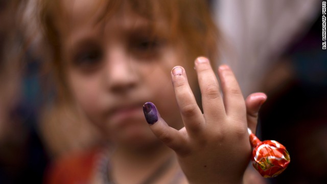 Polio, once a worldwide scourge, is endemic in just three countries now - Afghanistan, Nigeria and Pakistan. Pictured here is Ameena, a Pakistani girl participating in an anti-polio campaign, showing her ink-marked finger after being vaccinated for polio in Rawalpindi, Pakistan, Monday, October 7, 2013.