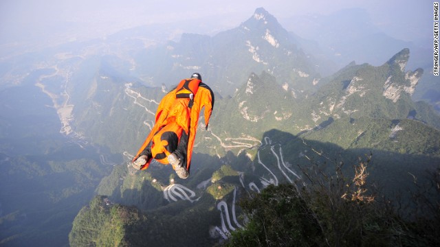 Image, taken on October 8, shows Victor Kovats jumping into a valley in Tianmen Mountain National Forest Park.