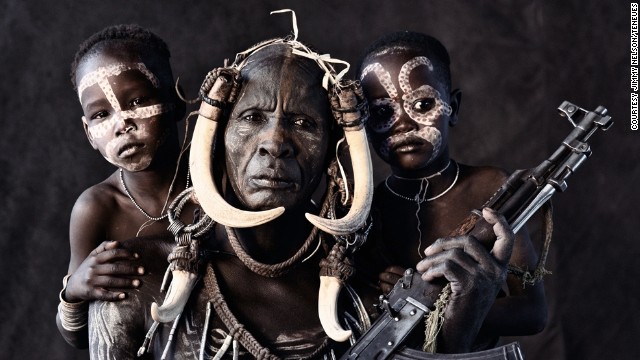 Nelson says the most challenging part of his African journey was approaching the Ethiopian tribes, like the Mursi, pictured. He says they were very protective of their territory, and he was often greeted by men carrying Kalashnikov rifles.