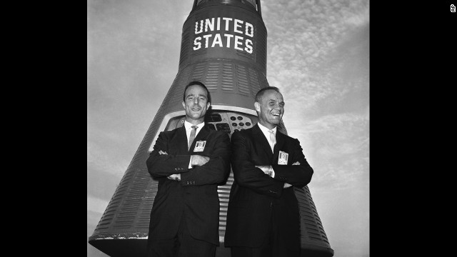 Glenn, right, and Carpenter in front of a Mercury Capsule after Glenn was named to make the country's first manned orbital flight, on November 29, 1961, in Cape Canaveral, Florida. Carpenter was chosen as his backup pilot. 
