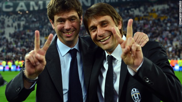 Juventus president Andrea Agnelli (left) celebrates the Old Lady's 2013 Serie A title win with the club's coach Antonio Conte.