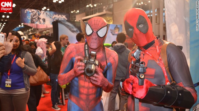 Popular Marvel Comics characters <a href='http://ireport.cnn.com/docs/DOC-1047487'>Spider-Man and Deadpool</a> pose with their accessories of choice.