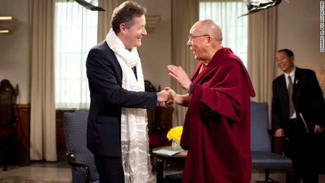 The Dalai Lama presented Morgan with a white Tibetan khata ceremonial scarf. "He exudes such warmth and serenity," wrote Morgan. 