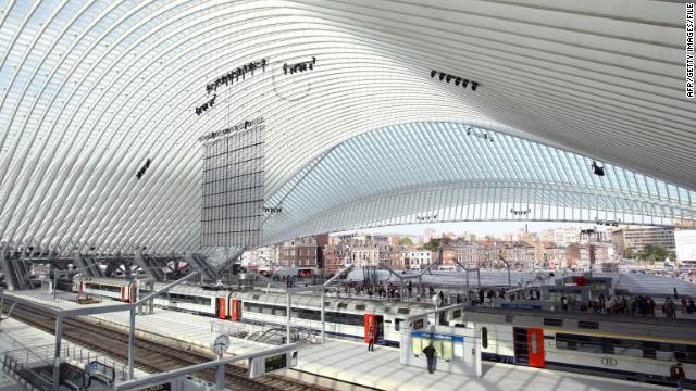 The interior of the Liège-Guillemin station in Liege, Belgium. The facility's ultra-modern glass and steel facade is featured in promotional posters for upcoming Wikileaks docu-drama, The Fifth Estate, starring Benedict Cumberbatch. Although far from Belgium's biggest or busiest station, Liège-Guillemin is fully equipped for high speed arrivals and departures as well as commuter trains.