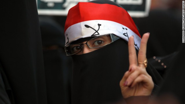 Yemenis shout slogans during a rally commemorating the second anniversary of a major clash between opposition protesters against former Yemeni president Ali Abdullah Saleh and security forces, in the capital Sanaa, on September 18, 2013.