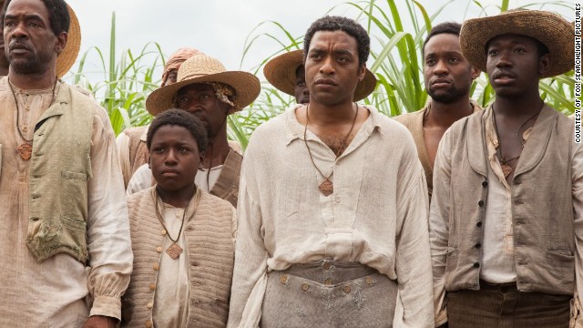 Chiwetel Ejiofor (forefront) stars as Solomon Northup in Fox Searchlight Pictures' 