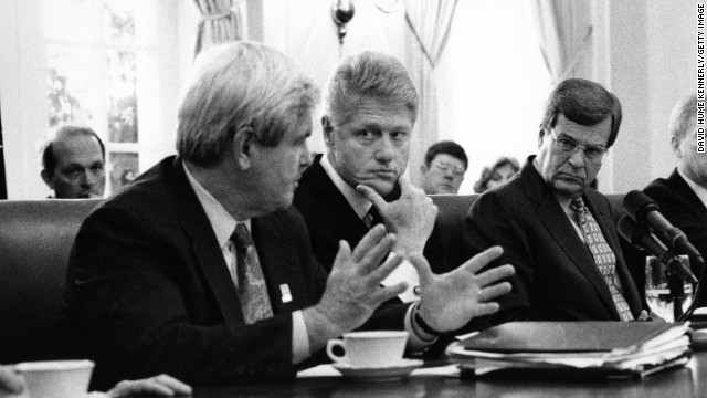 President Bill Clinton, second from left, and Senate Minority Leader Trent Lott, third from left, listen to House Speaker Newt Gingrich in the White House Cabinet Room in February 1996. Clinton and Democrats worked with Gingrich, Lott and other Republicans that year to pass landmark welfare reform.