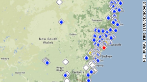 Nearly 100 fires burned across New South Wales on October 18.