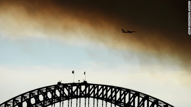 Smoke fills the sky over the Sydney Harbour Bridge on October 17.