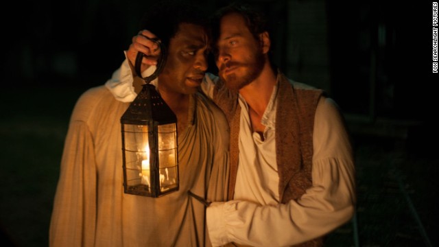 <strong>No. 10:</strong> It's difficult to think of "12 Years a Slave" as a "favorite" because of the painful history it unflinchingly presents, but we understand why CNN readers voted for it. If nothing else, this masterful film will be a favorite of cinephiles for years to come thanks to its tireless director, top-notch script and incredible performances from stars such as Chiwetel Ejiofor, left, and Michael Fassbender.