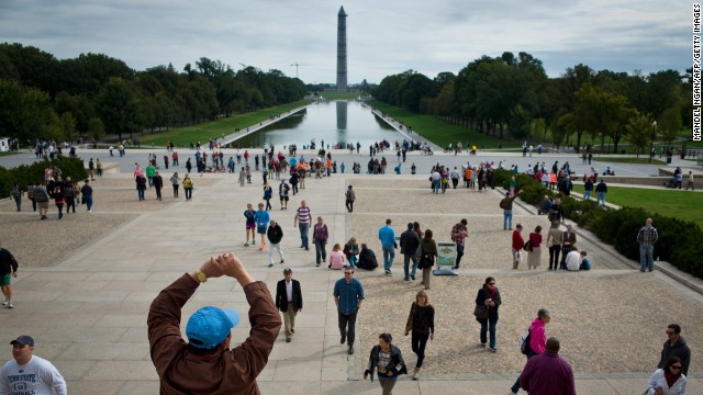 Tourists flock to memorials in Washington on Saturday, October 19, the first weekend after the end of the partial government shutdown. The Washington Monument and other landmarks across the country have reopened to the public after the 16-day shutdown. The government impasse ended when President Barack Obama signed a spending and debt ceiling agreement that Congress passed, averting a possible default. 