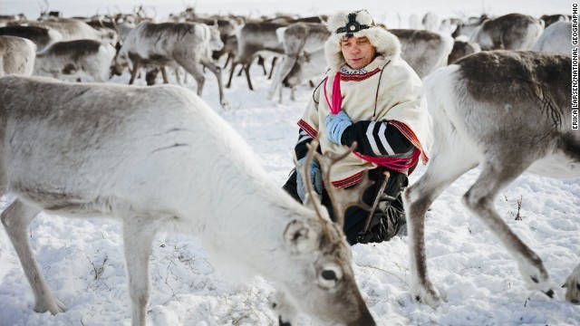 The photographs are part of a National Geographic exhibition called "Women of Vision," featuring 11 female photojournalists. Here, a herder in Norway practices a time-honored custom called yoiking -- chanting softly while tending his reindeer.