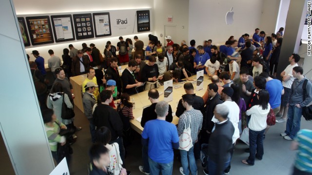 Shoppers line up outside an Apple Store in the SoHo neighborhood of New York to be among the first to buy an iPad on April 3, 2010.