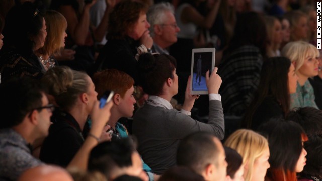 An audience member uses an iPad to photograph a fashion show on May 1, 2012 in Sydney, Australia. 