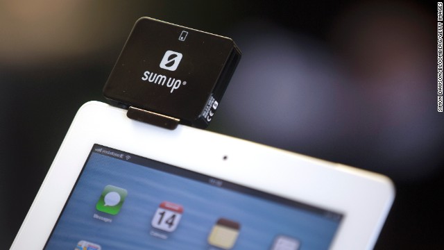 Small businesses and other merchants are increasingly using tablets to process mobile paymants. This credit and debit card reader, manufactured by SumUp Ltd., is attached to an iPad in Dublin, Ireland. 