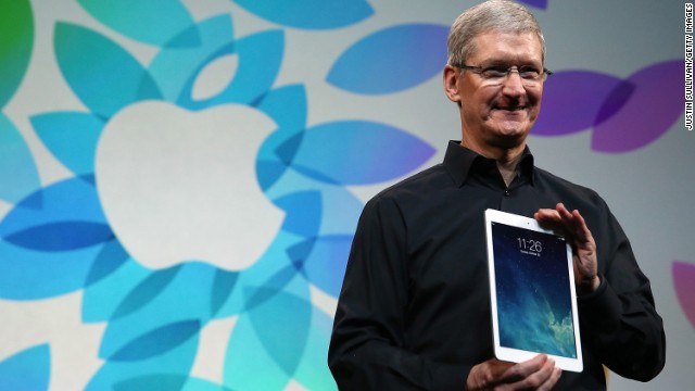 Apple CEO Tim Cook holds the new iPad Air during a press event Tuesday in San Francisco. 