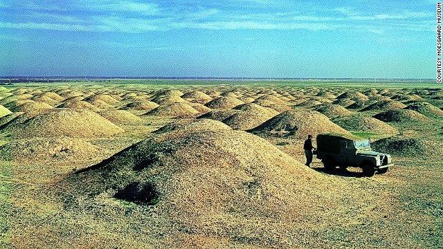 Thousands of 4,000 year-old burial mounds, leftover from the Dilmun civilization, once covered a third of Bahrain's landmass. The mounds were largely intact when this picture was taken in 1956.