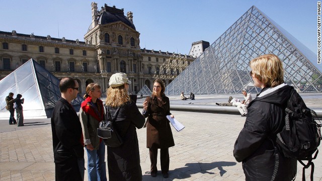 The Louvre is a beautiful place ... for scam artists. Tour guides can help you spot them. Hmm. That guy look kind of sketchy to you?