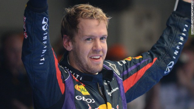 Sebastian Vettel celebrates his Indian Grand Prix victory to clinch his fourth straight F1 world title.