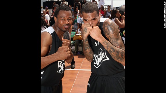 Pro boxer Shane Mosley, left, and Brown pose at the 2013 BET Experience in Los Angeles on June 29. 