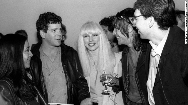 Reed, Debbie Harry of Blondie, center, and Iggy Pop, second from right, attend a party for a book on Blondie in New York on May 4, 1982.