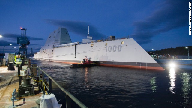 The USS Zumwalt, the U.S. Navy's newest warship, floats out of dry dock Monday, October 28, in Bath, Maine. The first of the new <a href='http://security.blogs.cnn.com/2013/10/29/bigger-faster-deadlier-navy-launches-new-stealth-destroyer/'>DDG-1000 class of destroyers</a>, it will be the Navy's largest stealthy ship when it begins missions.