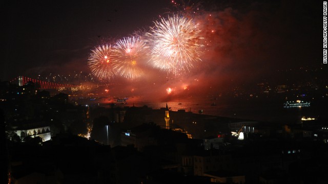 Fireworks explode above the Bosphorus Strait in Istanbul, Turkey, on Wednesday, October 29, during the anniversary of the declaration of the Turkish Republic. Turkey formally opened the world's first sea tunnel connecting two continents. The 8.5-mile long tunnel linking Istanbul's European and Asian sides includes an immersed tube tunnel which officials say is the world's deepest, at nearly 200 feet below the sea level.