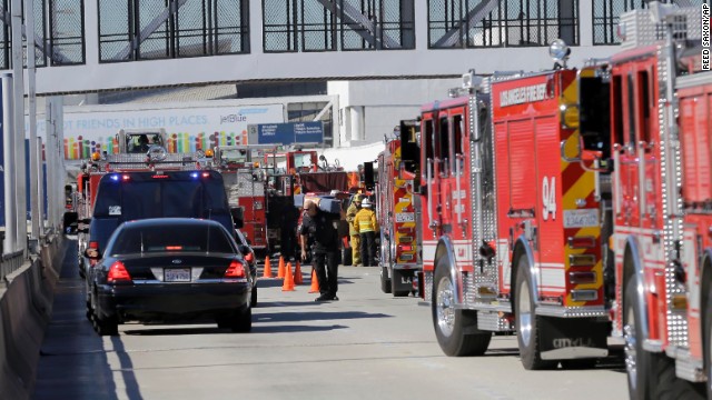 First responders and emergency vehicles arrive at the airport.