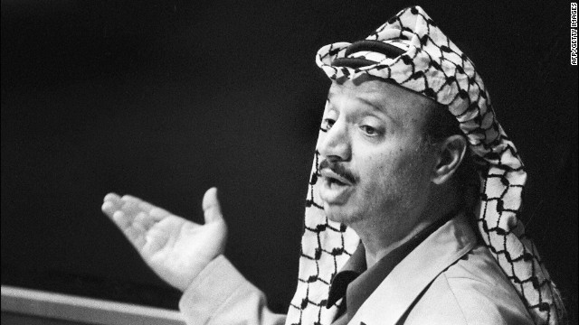 In November 1974, Arafat addresses the General Assembly of the United Nations. "I have come bearing an olive branch and a freedom fighter's gun," he was quoted as saying. "Do not let the olive branch fall from my hand."