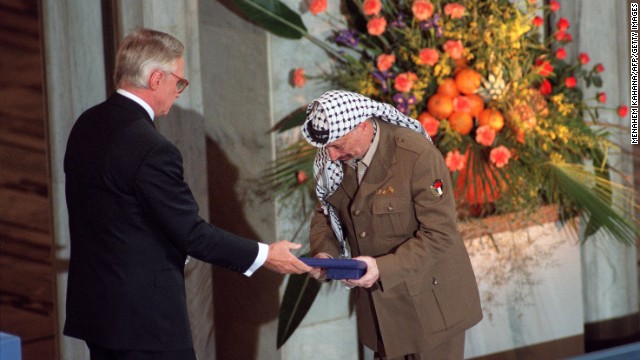 Arafat accepts the Nobel Peace Prize on December 10, 1994. He collected the prize jointly with Rabin and Israeli Foreign Minister Shimon Peres, in recognition of their historic peace accord. 