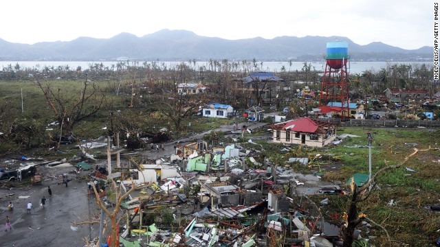 A general shot shows houses destroyed by the strong winds caused by typhoon Haiyan at Tacloban, eastern island of Leyte on November 9, 2013.