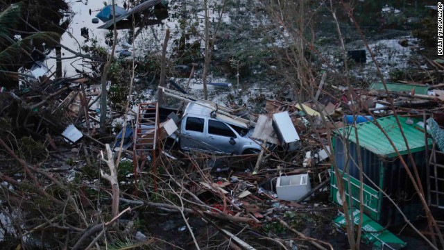 A vehicle lies amid Tacloban debris on November 9.