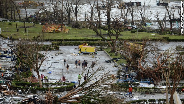 Fallen trees litter the ground at the Tacloban airport on Saturday, November 9.