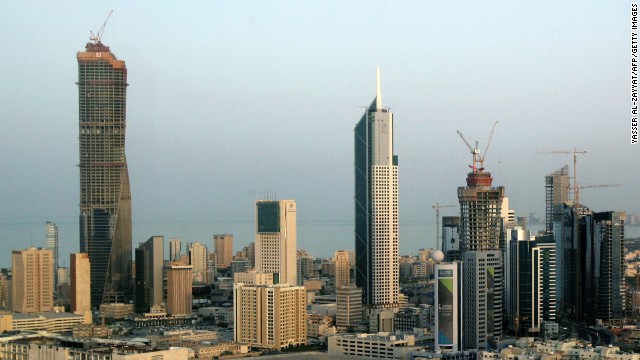 Completed in 2011, Al Hamra Tower (left) in Kuwait City is shown here under construction in 2009. It rises to an architectural height of 1,354 feet (412.6 meters) and is occupied to a height of 1,218 feet (371.4 meters). 