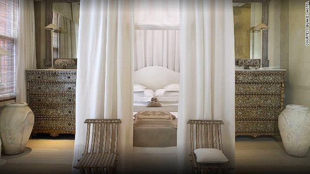 The Corfu Suite at the <strong>Blakes Hotel</strong> in London won the judges' vote for the sexiest hotel room for its white drapes, mother-of-pearl accents and a four-poster bed "you can't leave." Do you agree with the judges? 