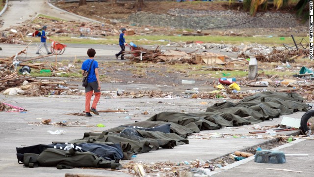 Body bags are lined up in Tacloban on November 13.