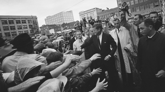 President John F. Kennedy greets supporters during his visit to Fort Worth, Texas, on Friday, November 22, 1963. This month marks 50 years since his assassination in Dallas, an event that jarred the nation and fueled a multitude of conspiracy theories about whether Kennedy was killed by a single gunman acting alone in the Texas School Book Depository. Here are some images from that fateful day as it unfolded.