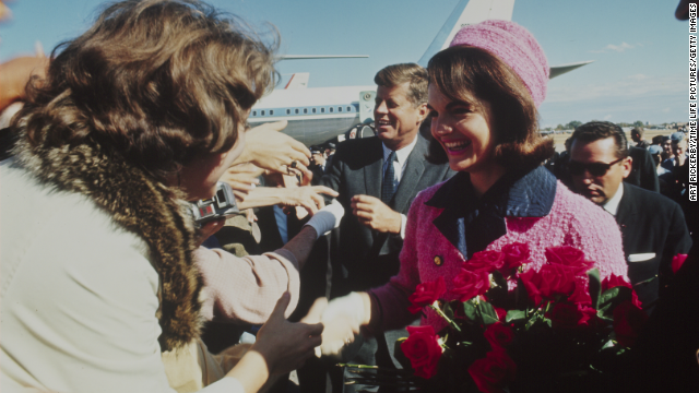 The Kennedys arrive at Love Field in Dallas on a trip to advance the upcoming 1964 campaign. 