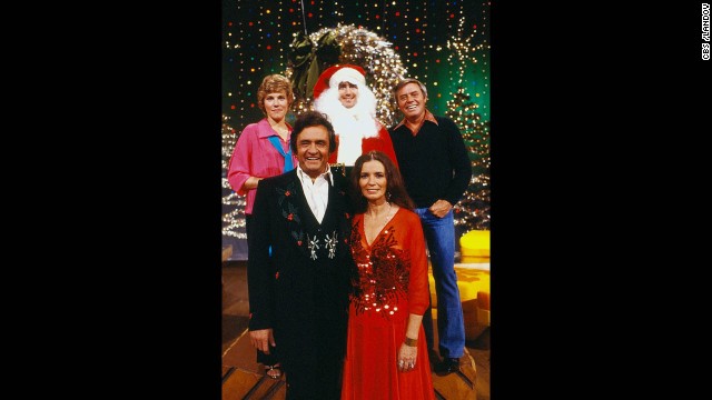 Anne Murray, clockwise from upper left, Kaufman as Santa, Tom T. Hall, June Carter Cash and Johnny Cash appear on the "Johnny Cash Christmas Special" on CBS in 1979. 