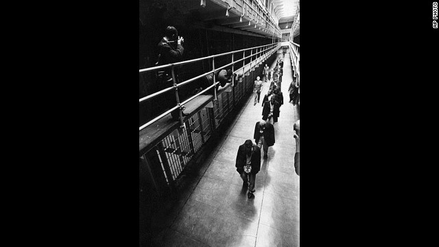 A line of handcuffed prisoners, the last convicts held at Alcatraz prison, walk through a cell block as they are transferred to other prisons from Alcatraz Island on San Francisco Bay, California, on March 21, 1963. Alcatraz, known as "The Rock," was a federal penitentiary for 29 years and a prison for more than a century. 