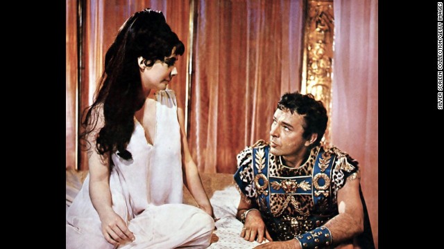 Elizabeth Taylor and Richard Burton appear in a publicity still for the film "Cleopatra," which premiered on June 12, 1963. The historical drama, directed by Joseph L. Mankiewicz, starred Taylor as Cleopatra, and Burton as Mark Antony. 