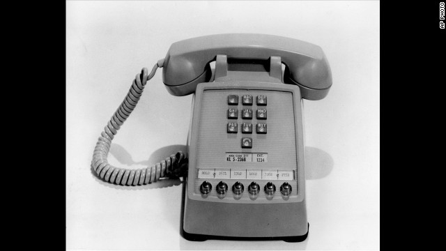 The first push-button telephone was introduced on February 28, 1963. It was made available to AT&amp;T customers on November 18, 1963. The phone has extension buttons at the bottom for office use.