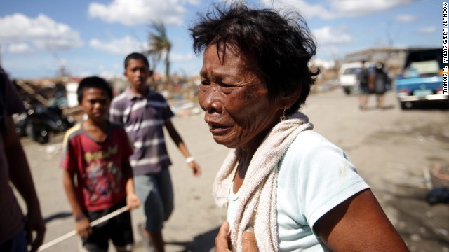 A survivor reacts to the damage at a residential area in Tacloban on November 15.