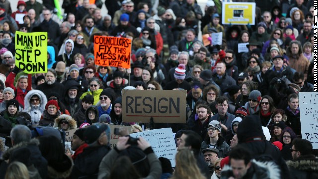 Hundreds gather in Toronto's Nathan Phillips Square on November 13 to call for the Mayor to resign.