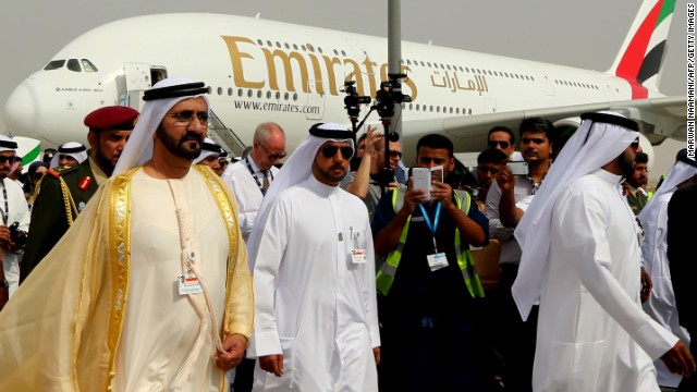 Ruler of Dubai Sheikh Mohammed Bin Rashid al-Maktoum walks past an Emirates Airbus A380 at the Dubai Airshow.